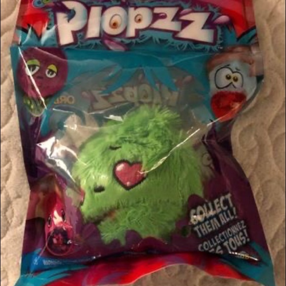 ORB Odditeez Squishy Ball Fidget (it’s green and purple)